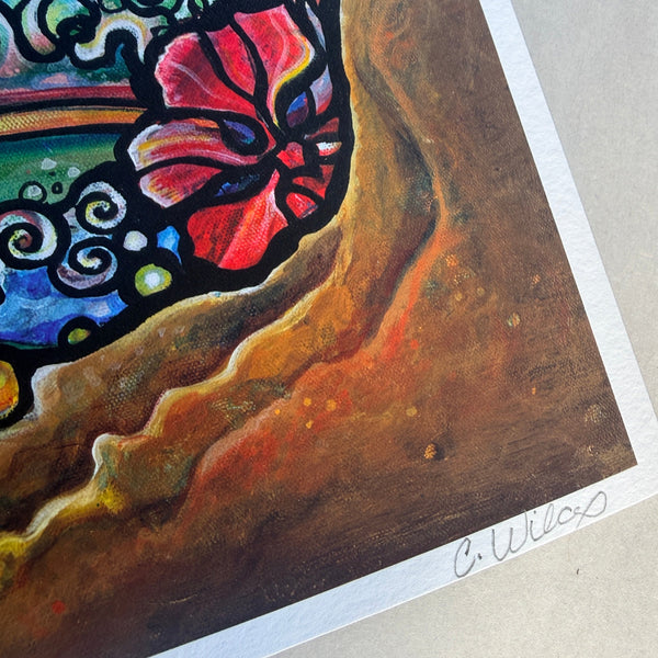 Colorful abstract artwork with a signature on a textured surface