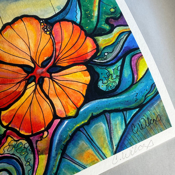 Colorful floral artwork with an orange flower on a gray surface